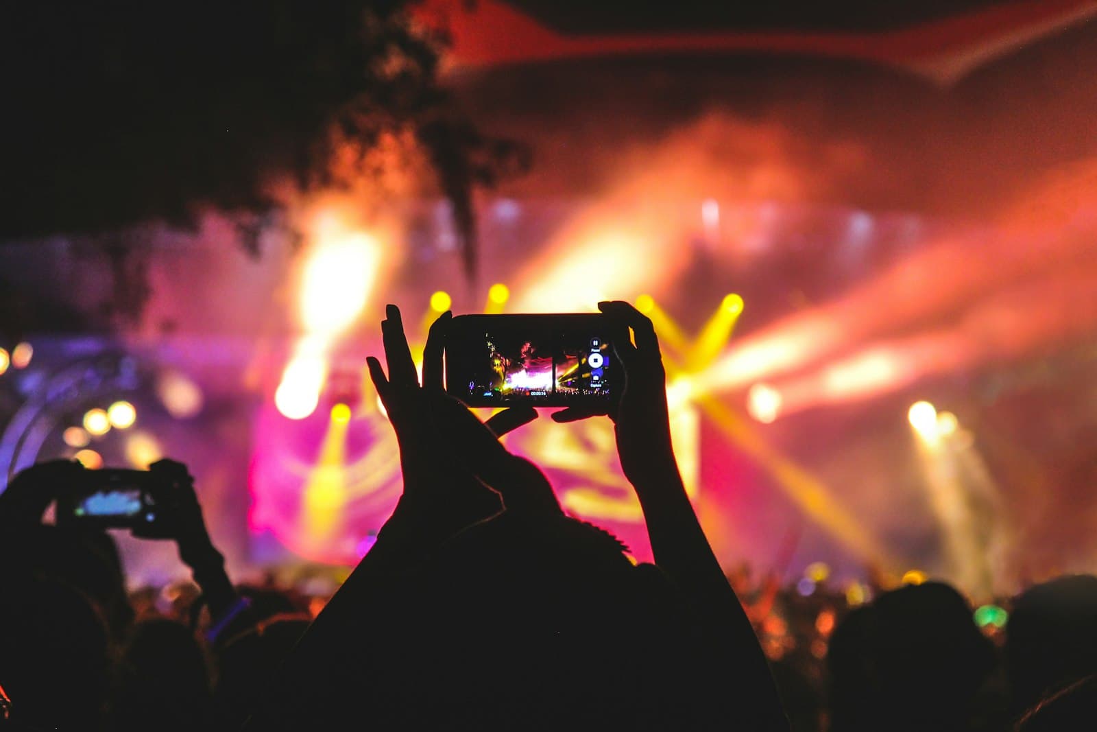 Sample: a crowd under stage lights